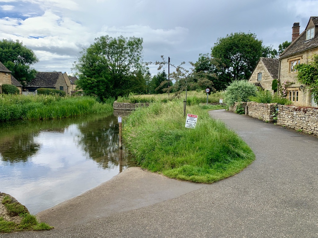 Residential homes line the river that runs through Lower Slaughter