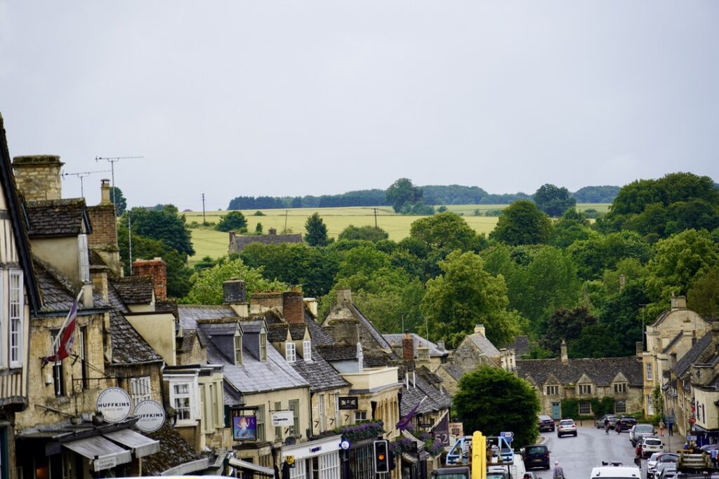Burford's beautiful High Street runs downhill, so the view from the top offers a panorama of both the town and the nearby fields.