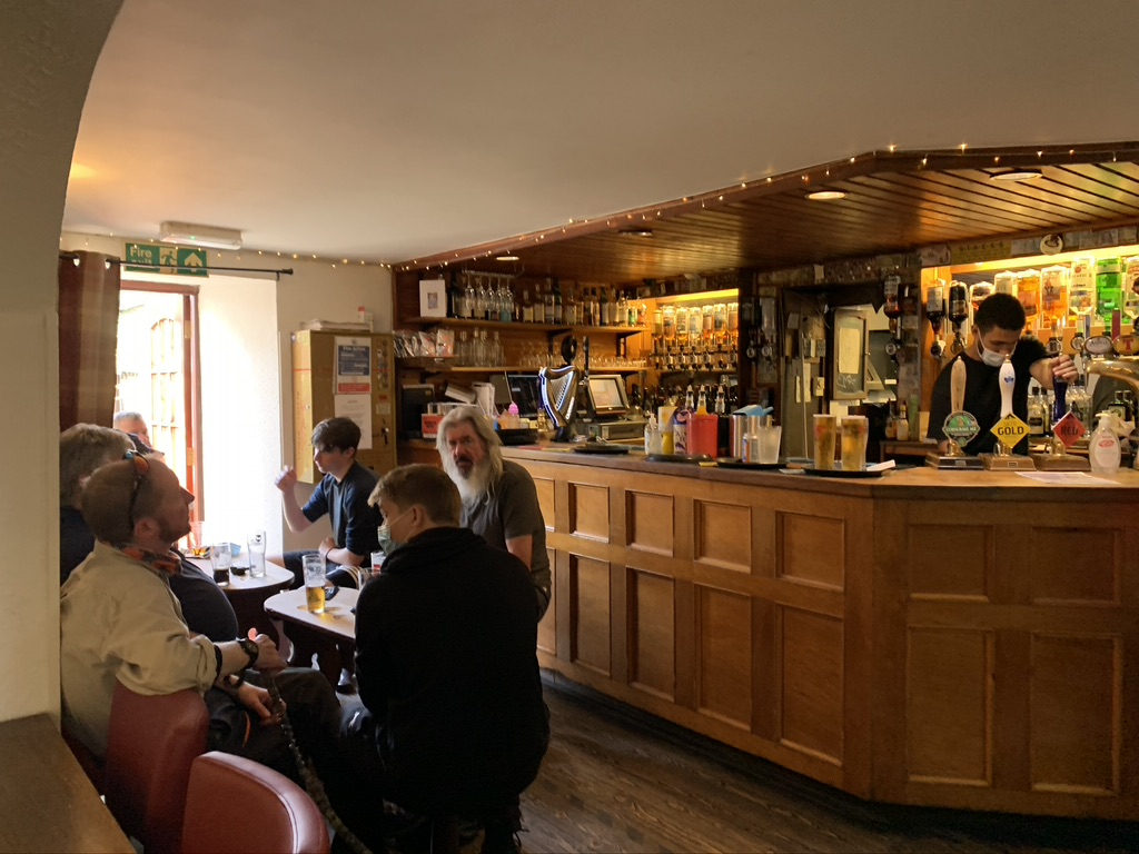 The pub at The Old Inn offers an inviting bar, plenty of tables, and great food!