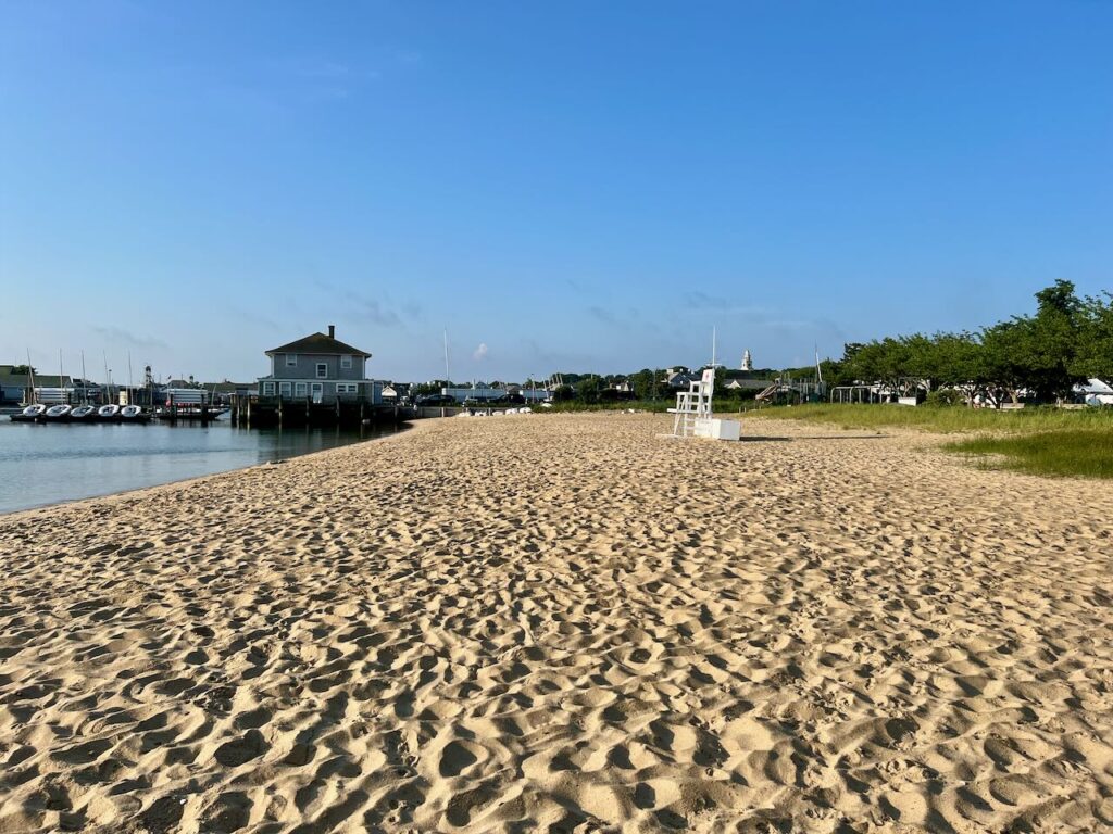 Beautiful beach with a clear blue sky in Nantucket.